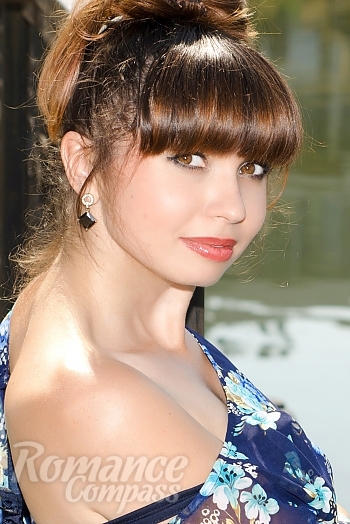 Ukrainian mail order bride Nataliya from Nikolaev with brunette hair and hazel eye color - image 1