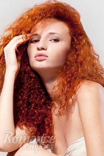 Ukrainian mail order bride Victoria from Kharkov with red hair and green eye color - image 1