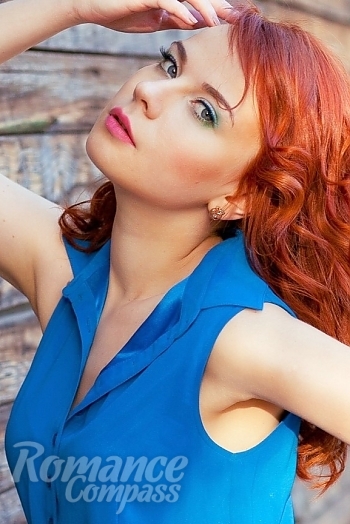 Ukrainian mail order bride Marina from Nikolaev with red hair and blue eye color - image 1