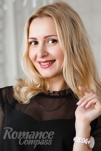 Ukrainian mail order bride Natalia from Nikolaev with blonde hair and brown eye color - image 1
