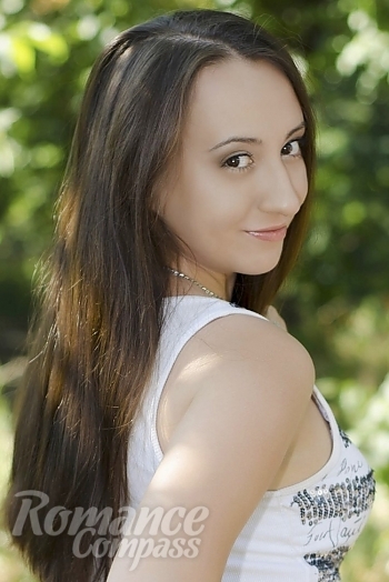Ukrainian mail order bride Ksenia from Nikolaev with brunette hair and brown eye color - image 1