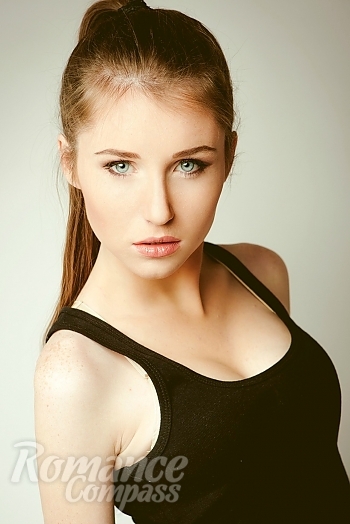 Ukrainian mail order bride Ruslana from Vinnitsa with light brown hair and blue eye color - image 1