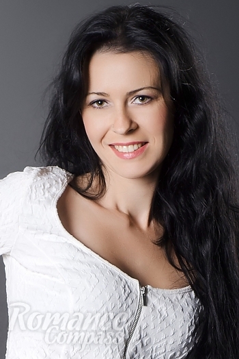Ukrainian mail order bride Angelica from Nikolaev with black hair and green eye color - image 1