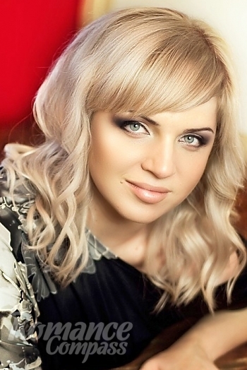 Ukrainian mail order bride Anastasiya from Kiev with blonde hair and blue eye color - image 1