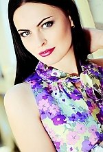 Ukrainian mail order bride Diana from Kiev with black hair and blue eye color - image 2