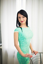 Ukrainian mail order bride Tatiana from Luhansk with black hair and green eye color - image 2