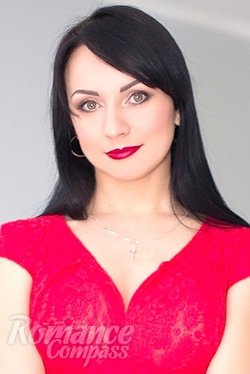 Ukrainian mail order bride Tatiana from Luhansk with black hair and green eye color - image 1