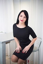 Ukrainian mail order bride Tatiana from Luhansk with black hair and green eye color - image 7