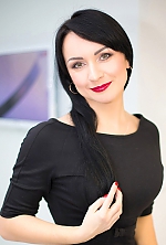 Ukrainian mail order bride Tatiana from Luhansk with black hair and green eye color - image 4