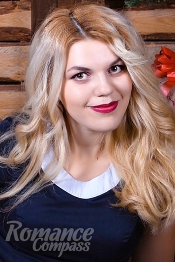 Ukrainian mail order bride Anastasia from Nikolaev with blonde hair and green eye color - image 1