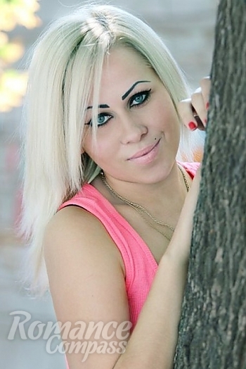 Ukrainian mail order bride Nataliy from Nikolaev with blonde hair and blue eye color - image 1