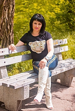 Ukrainian mail order bride Olga from Nikolaev with black hair and green eye color - image 2