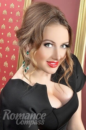 Ukrainian mail order bride Karina from Belaya Cerkov with light brown hair and blue eye color - image 1