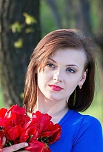 Ukrainian mail order bride Ilona from Kryvoy Rog with light brown hair and blue eye color - image 3