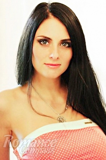 Ukrainian mail order bride Anna from Nikolaev with black hair and green eye color - image 1