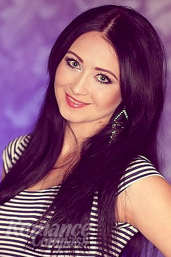 Ukrainian mail order bride Alina from Odessa with black hair and green eye color - image 1