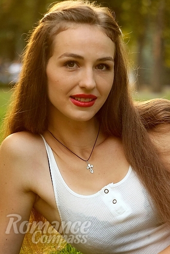 Ukrainian mail order bride Anastasia from Nikolaev with light brown hair and brown eye color - image 1
