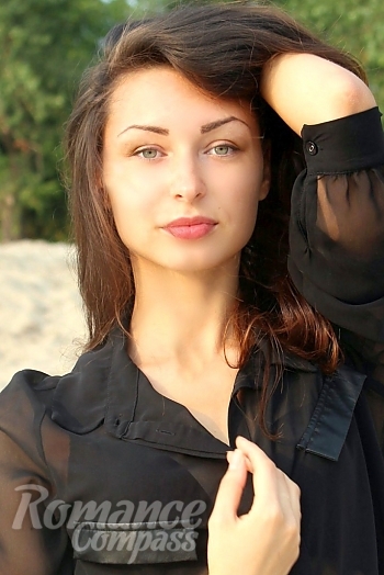 Ukrainian mail order bride Maryna from Kyiv with black hair and green eye color - image 1