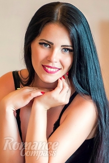 Ukrainian mail order bride Alena from Nikopol with black hair and blue eye color - image 1