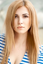 Ukrainian girl Nina,25 years old with brown eyes and light brown hair.