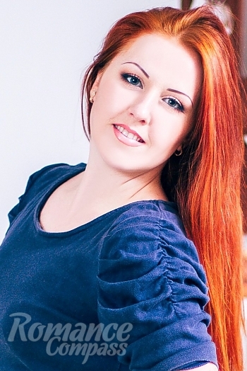 Ukrainian mail order bride Irina from Voznesensk with red hair and blue eye color - image 1