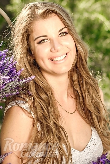 Ukrainian mail order bride Karina from Odessa with light brown hair and green eye color - image 1
