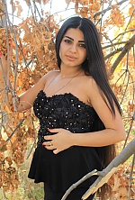 Ukrainian mail order bride Isabella from Kherson with black hair and grey eye color - image 4