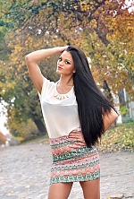 Ukrainian mail order bride Olga from Kiev with black hair and green eye color - image 3