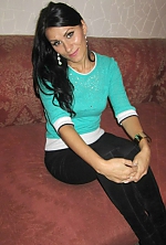 Ukrainian mail order bride Ludmila from Mariupol with black hair and green eye color - image 3