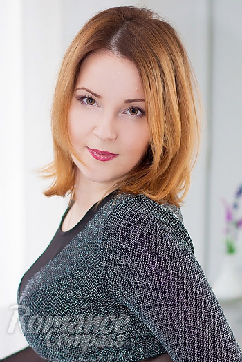 Ukrainian mail order bride irina from Luhansk with red hair and brown eye color - image 1