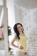 Ukrainian mail order bride Anna from Nikolaev with black hair and hazel eye color - image 3