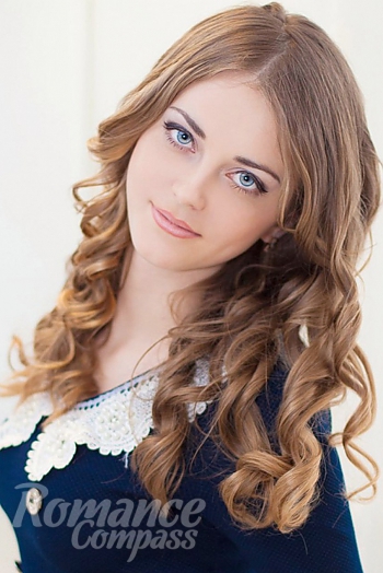 Ukrainian mail order bride Anna from Lugansk with light brown hair and blue eye color - image 1