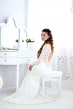 Ukrainian mail order bride Anastasya from Kiev with light brown hair and green eye color - image 8