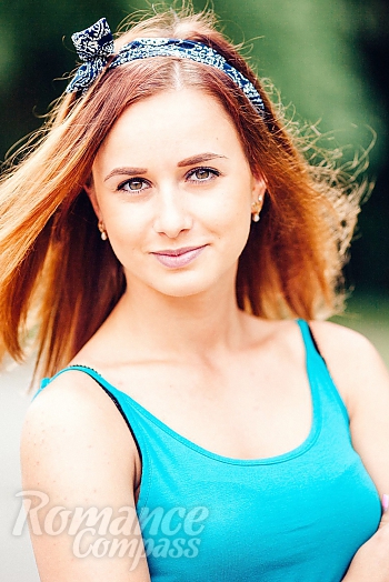 Ukrainian mail order bride Irina from Poltava with auburn hair and green eye color - image 1