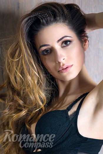Ukrainian mail order bride Lyudmila from Odessa with brunette hair and hazel eye color - image 1