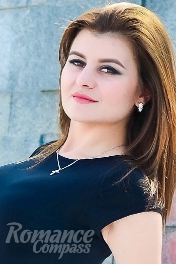 Ukrainian mail order bride Ira from Odessa with brunette hair and green eye color - image 1