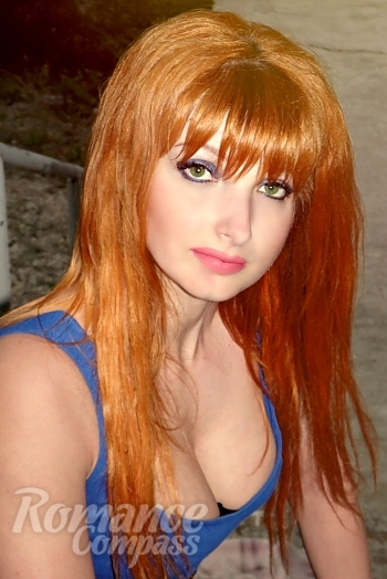 Ukrainian mail order bride Oksana from Nikolaev with red hair and green eye color - image 1