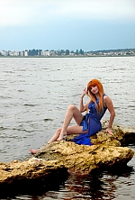 Ukrainian mail order bride Oksana from Nikolaev with red hair and green eye color - image 3