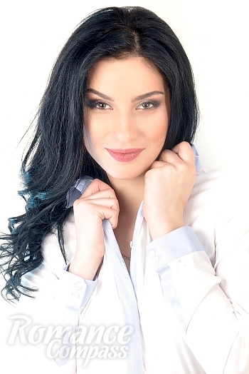 Ukrainian mail order bride Anna from Kharkiv with black hair and brown eye color - image 1