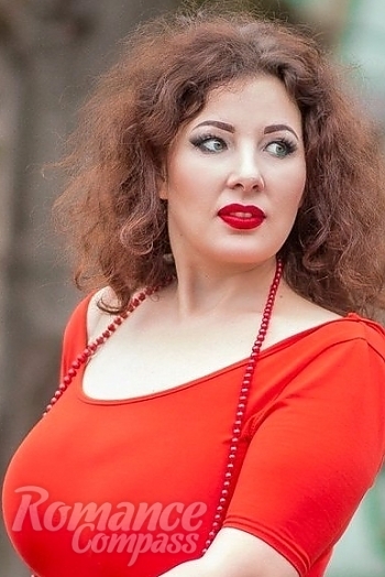 Ukrainian mail order bride Anastasia from Nikopol with brunette hair and green eye color - image 1