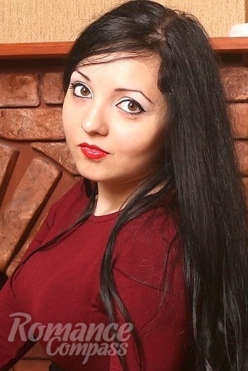 Ukrainian mail order bride Olena Afanasieva from Kiev with black hair and brown eye color - image 1