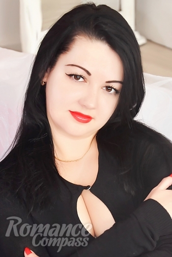 Ukrainian mail order bride Irina from Nikolaev with black hair and brown eye color - image 1