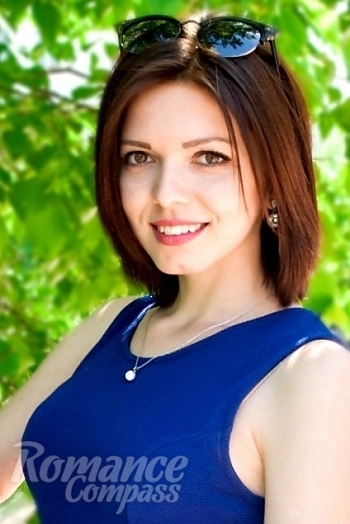 Ukrainian mail order bride Olga from Kharkiv with brunette hair and green eye color - image 1