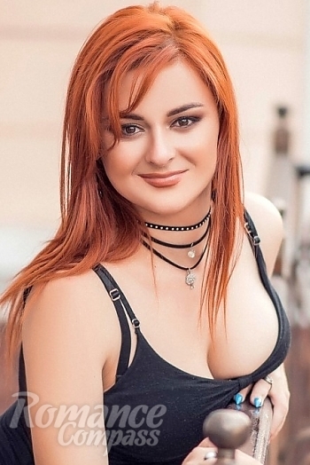 Ukrainian mail order bride Valeriya from Nikolaev with red hair and green eye color - image 1