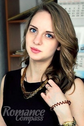 Ukrainian mail order bride Anastasia from Perevalsk with light brown hair and blue eye color - image 1