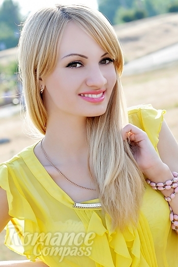 Ukrainian mail order bride Oksana from Kiev with blonde hair and hazel eye color - image 1