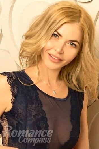 Ukrainian mail order bride Lyudmila from Kiev with blonde hair and green eye color - image 1