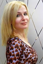 Ukrainian girl Olga,40 years old with green eyes and blonde hair.