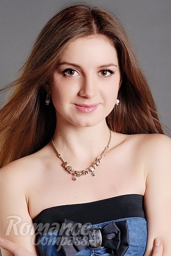 Ukrainian mail order bride Ksenia from Nikolaev with light brown hair and hazel eye color - image 1