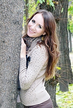 Ukrainian mail order bride Anna from Kropyvnytskyi with light brown hair and green eye color - image 4